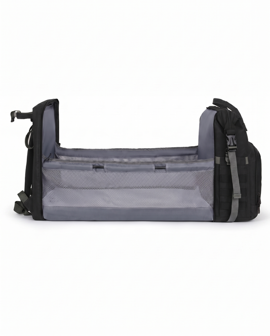 Black foldable baby nappy bag backpack converted into portable travel bassinet cot with mesh sides