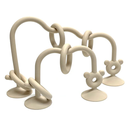 Silicone bead maze toy for babies with suction base, neutral beige color for feeding chair.