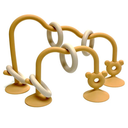 Silicone bead maze toy in yellow color for baby sensory and motor skills.