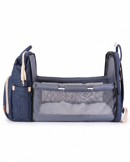 Navy blue foldable baby diaper backpack unfolded into portable travel cot bassinet