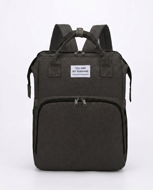 Black foldable baby diaper bag backpack with dual carry handles and large front zip pocket