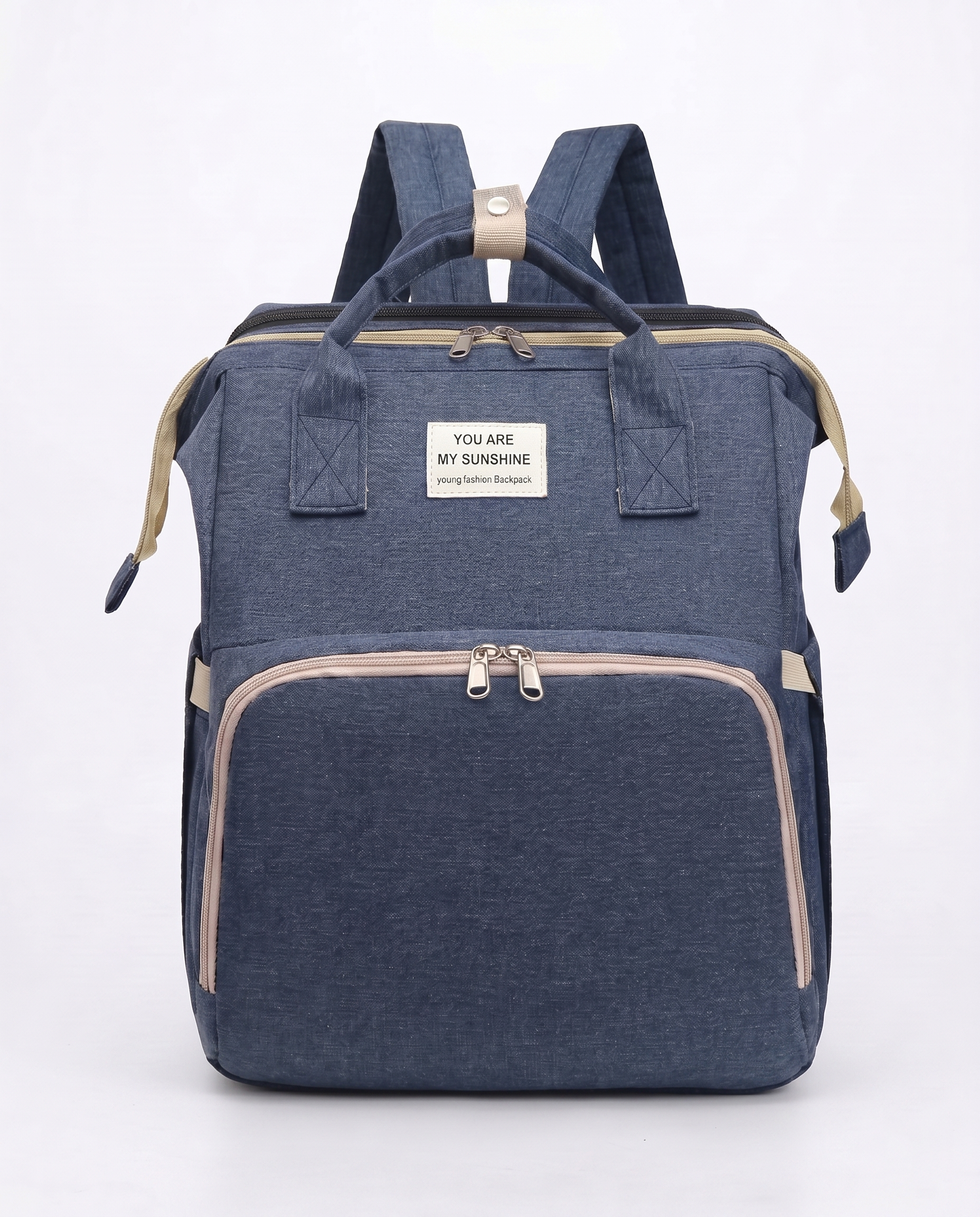 Navy blue foldable baby nappy bag backpack with beige trim and dual carry handles