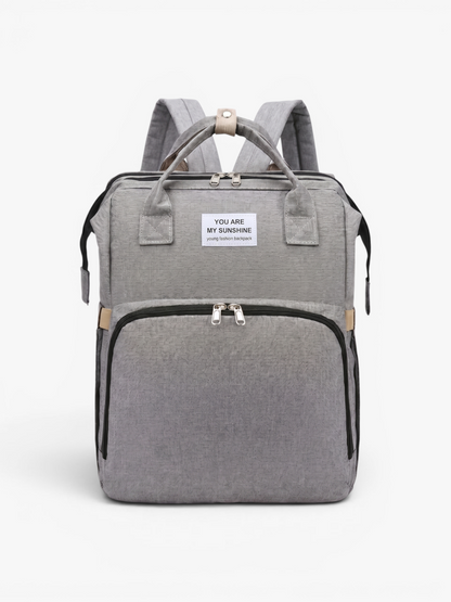Grey 3-in-1 diaper bag backpack with foldable baby bed and changing station | Early Nest