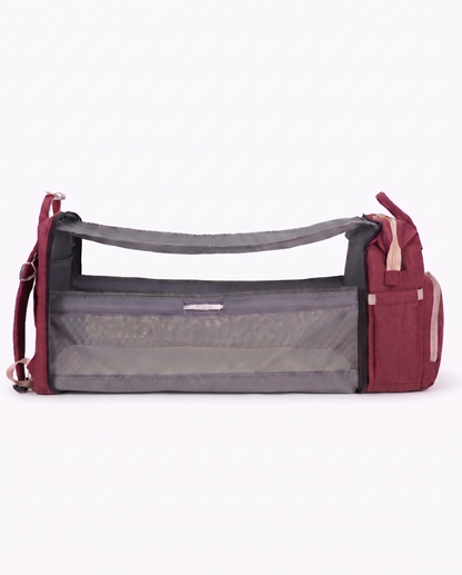 Red foldable nappy bag backpack converted into portable baby travel bassinet