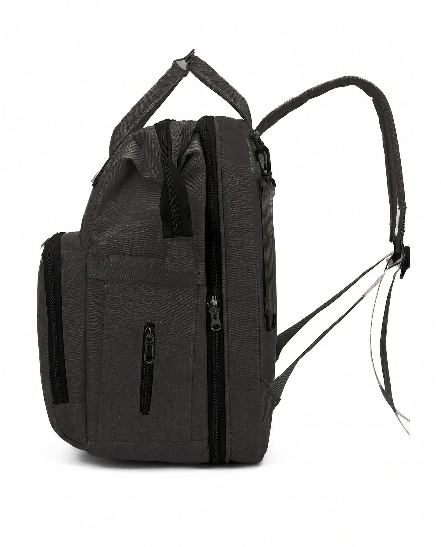 Black baby diaper bag backpack side view showing multiple zip pockets and padded shoulder strap