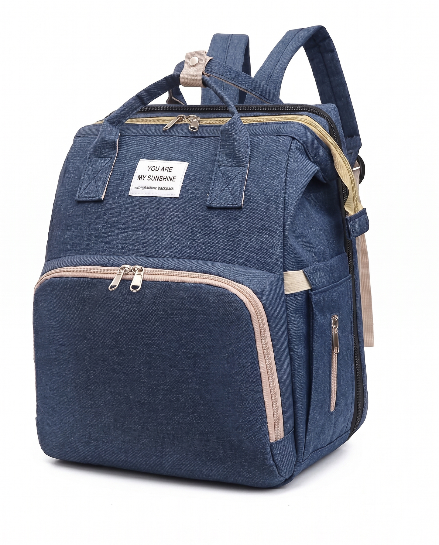 Deep navy blue baby nappy backpack with large front pocket and gold zip detail