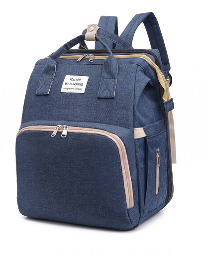 Deep navy blue baby nappy backpack with large front pocket and gold zip detail