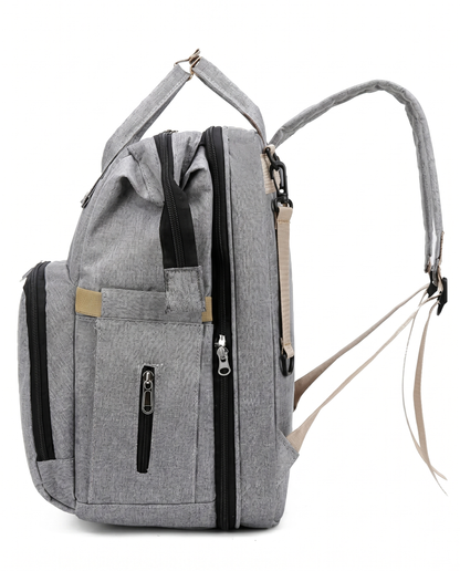 Grey baby diaper bag backpack side view with insulated bottle pocket and padded back panel