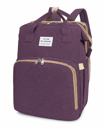 Large purple baby nappy bag backpack with dual carry handles and wide front zipper pocket