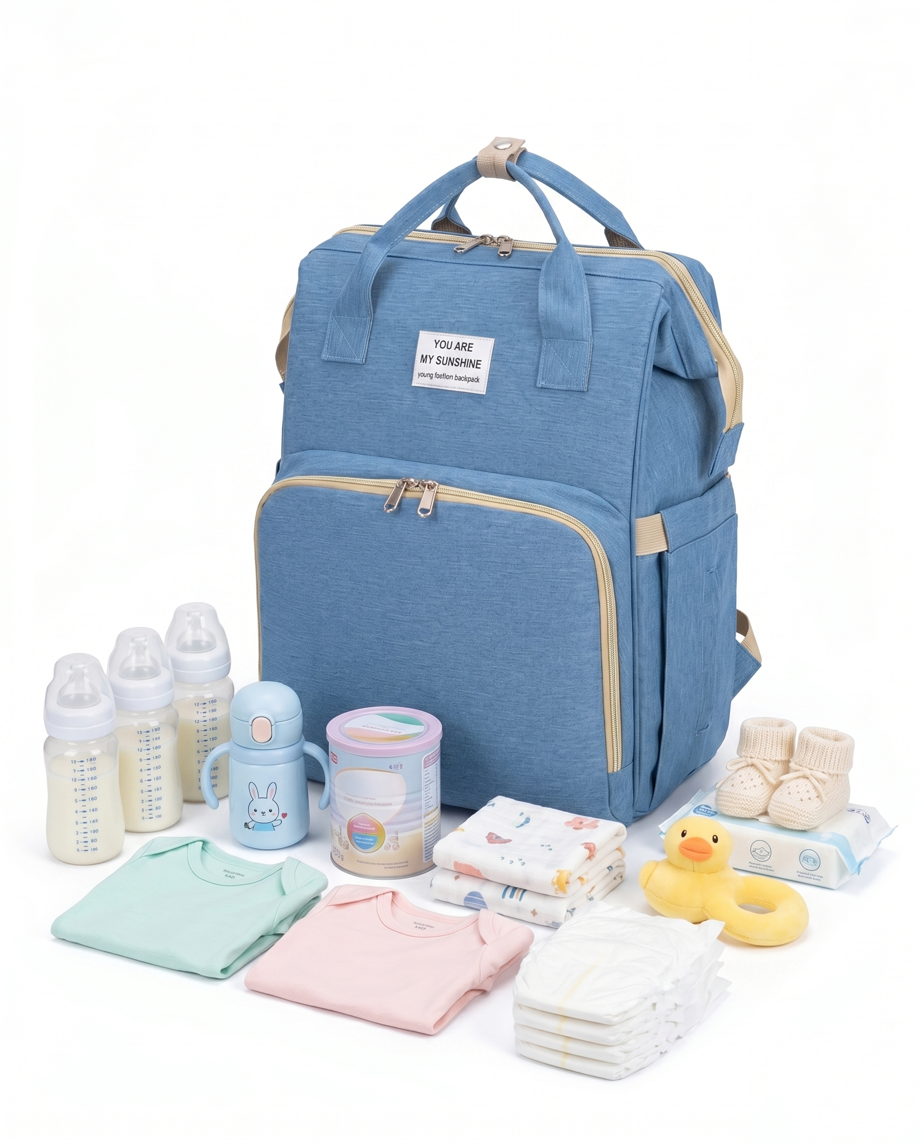 Sky blue baby diaper backpack displayed with nappies, bottles, formula, baby clothes and wipes