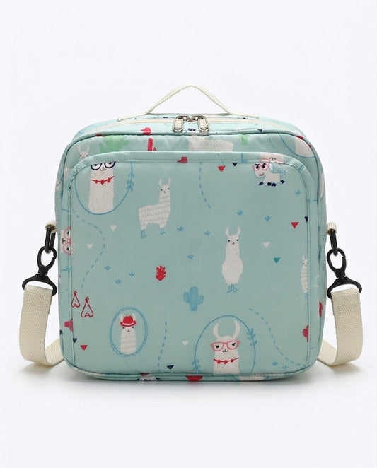 Compact nappy bag mint green alpaca print with adjustable crossbody strap, bottle holder and pram clip
