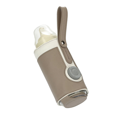 Portable USB Baby Bottle Warmer with baby bottle inside, showing insulated heating sleeve for on the go feeding.