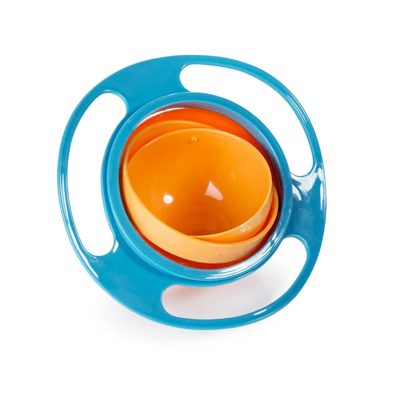 Kids spill proof gyro bowl with rotating inner bowl and easy grip handles, top view.